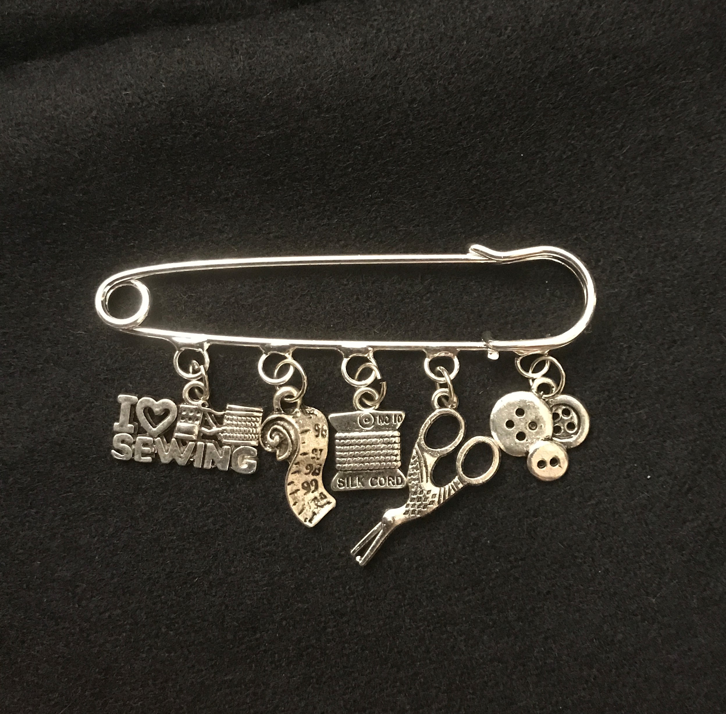 CHARM BROACH