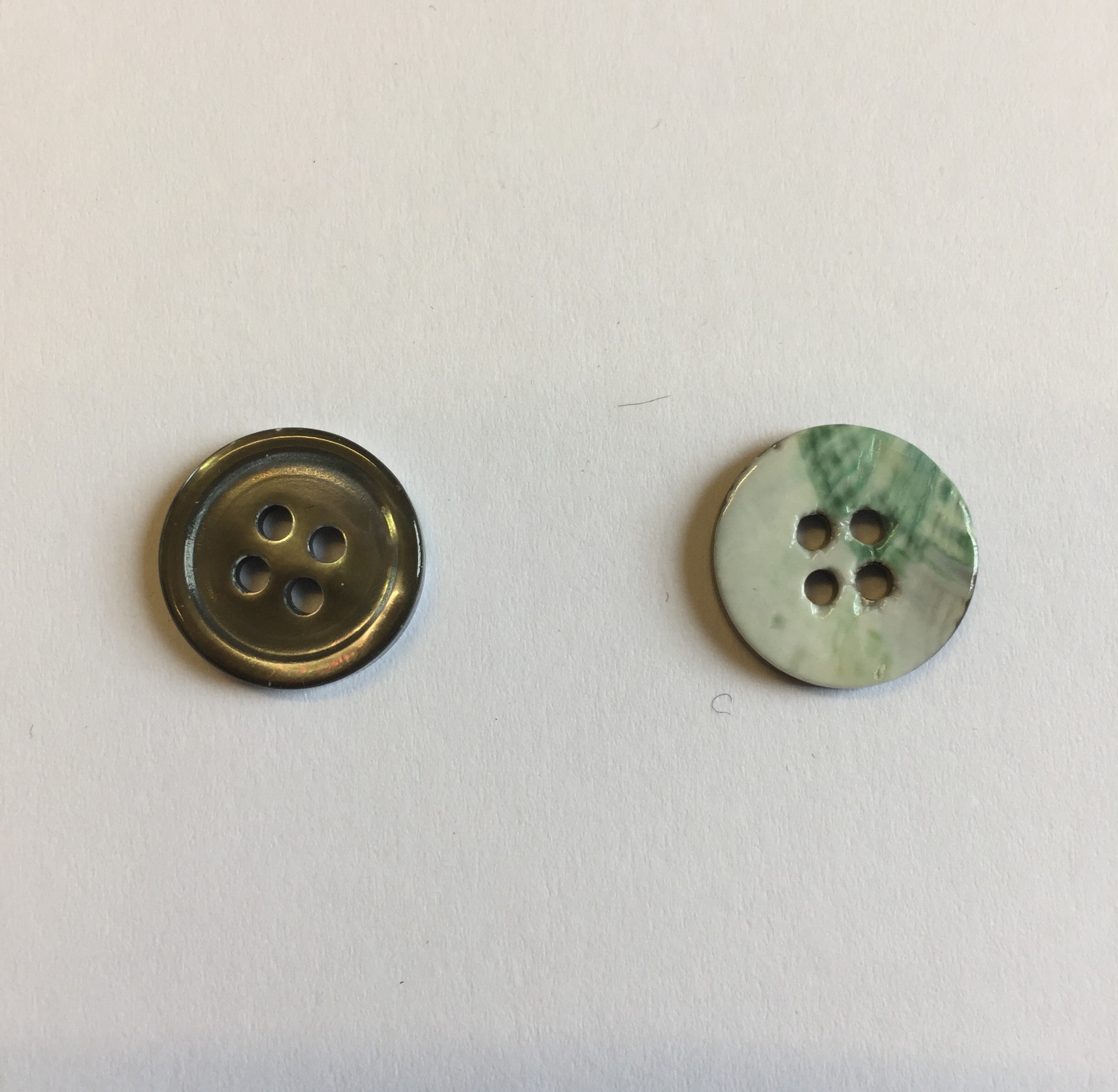 One Mother of Pearl Smoke 23L (14.8mm) Buttons