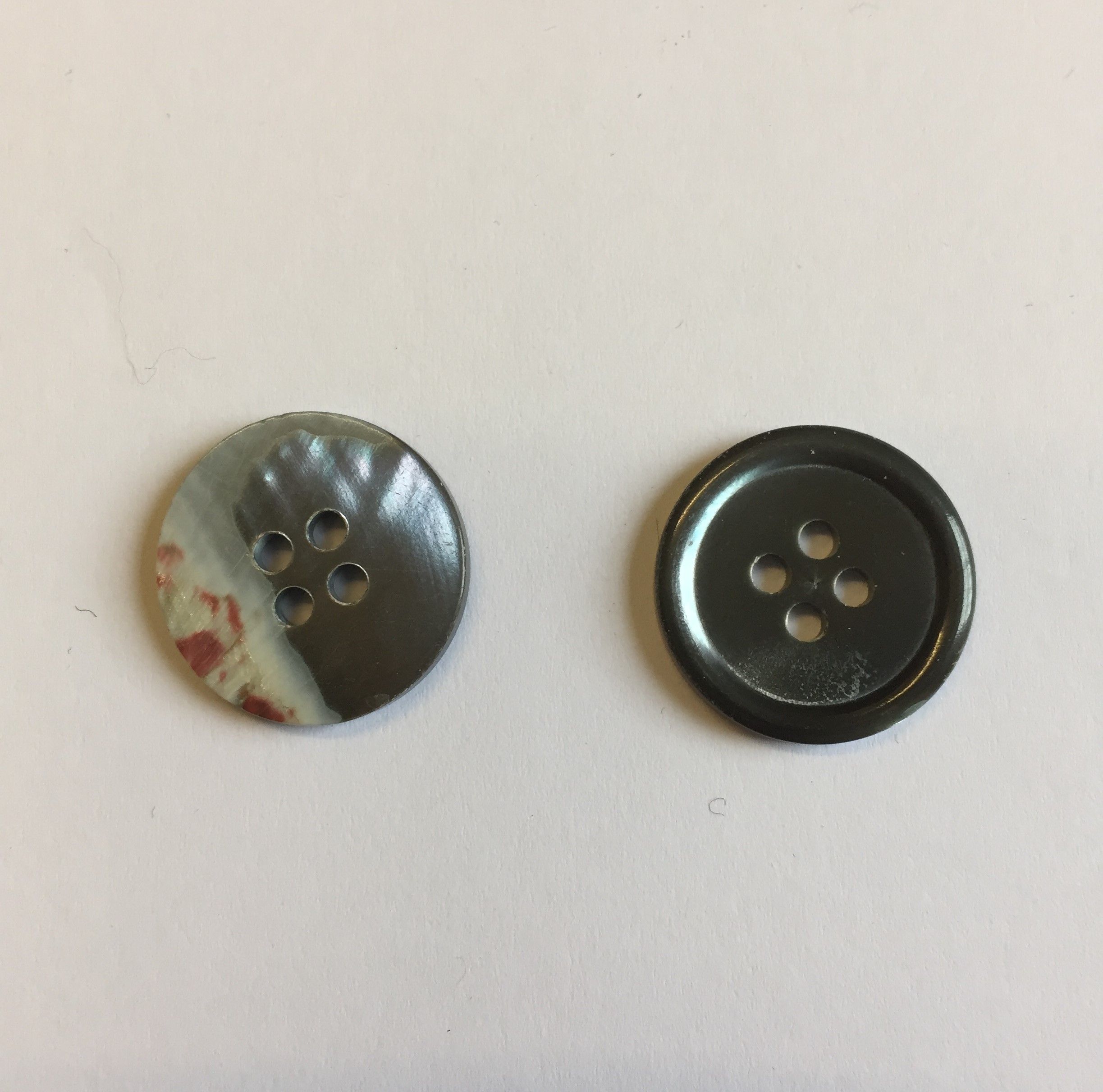 One Mother of Pearl Smoke 30L (19mm) Buttons